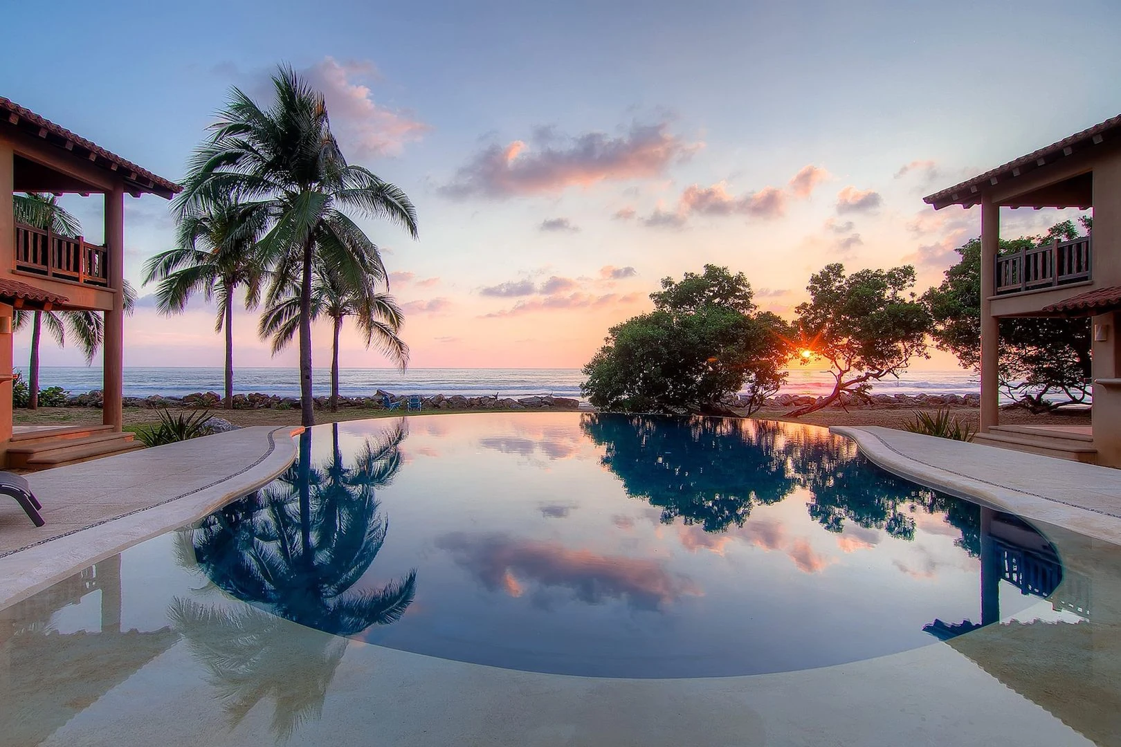 Salt-water infinity pool at sunset